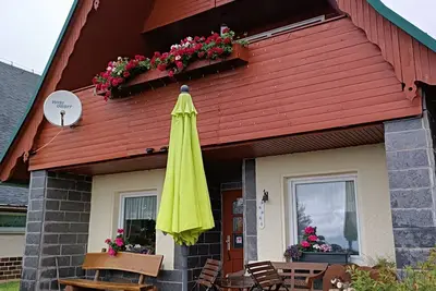 Image de Maison de vacances 'Finnhütte Hohe Klinge' avec vue sur montagne, terrasse privée et balcon