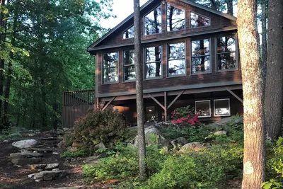 Image de Lovely waterfront home on Panther Pond with private tennis/pickleball court!