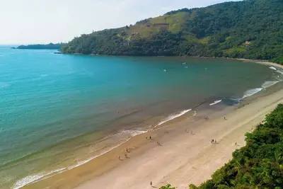 Image de Casa com WiFi, piscina e churrasq a 400m do mar