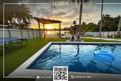 Image de Lakefront Luxe Near Hard Rock Stadium • Pool & Bbq