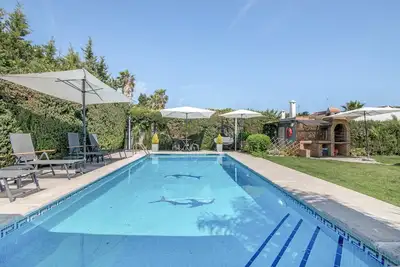 Image de Maison de vacances 'Golf Azul' avec piscine partagée, Wi-Fi et climatisation