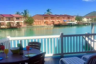 Waterfront two bed villa 3 mins walk to stunning Beach, air con and balcony