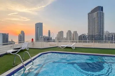 Gorgeous 2br with Pool  w Dubai Wheel View