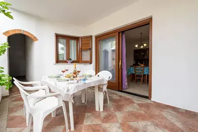 Image de Charmant appartement de trois pièces avec patio près de Budoni
