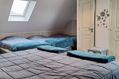 Image de Chambre 'Le Meslay N°10 - Chambre 6 Pers' avec Terrasse partagée, Jardin partagé et Wi-Fi