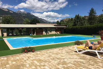 Image de Châlet a la montagne avec accès piscines, jeux d'enfants, restaurant pizzeria
