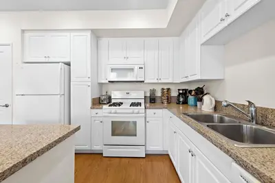 Image de Charming 2-bedroom with fitness room located within walking distance to spectrum