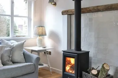 Image de Stylish Barn Retreat 10 mins to Saunton & Croyde • Log Burner • Ev