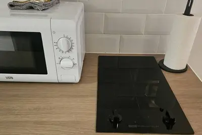 Image de Quatre studios indépendants équipée cuisine douche Wc canapé salle au calme