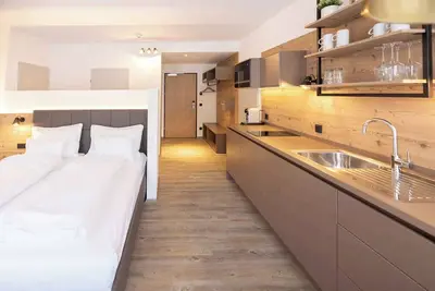 Image de Appartement d´hôtel avec chauffage et sauna