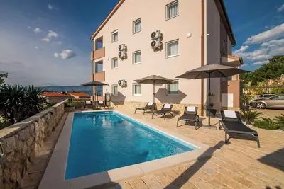 Image de Appartement de vacances Tentative d'appartement avec piscine et vue sur la mer