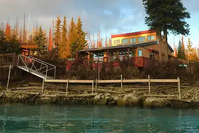 Pristine riverfront 2-bedroom house with private dock, huge deck, and gazebo!