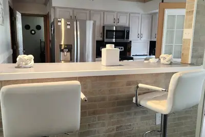 Image de Stunning 4-bedroom all ensuite with a beautiful backyard. Plenty of free parking