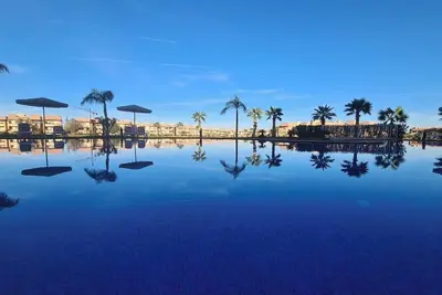 Image de Prestigia résidence mini-villa vue sur la piscine et le golf securiser 24 /24