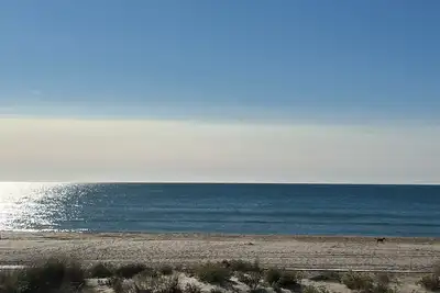 Image de Grand deux pièces les pieds dans l’eau