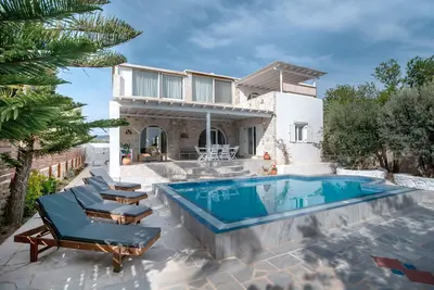 Image de Maison de vacances 'Cavos Paros Oasis' avec piscine privée, Wi-Fi et climatisation