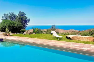 Image de Charming country villa with pool near CefalĂą