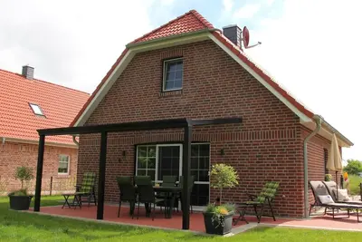 Image de Relaxing vacation home \"Sielentium\" at the Sieltief near Greetsiel!