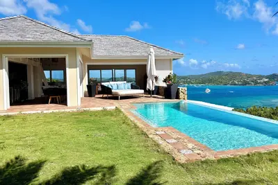 Image de Modern, luxury family home overlooking Falmouth Harbour and surrounding ocean.