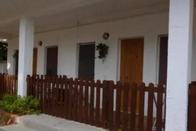 Image de Appartement 'La Quiete - Veranda Piccola 4' avec piscine partagée, Wi-Fi et climatisation