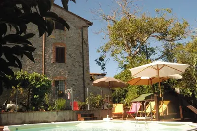 Image de Appartement 'Appartamento Mansarda' avec piscine partagée, Wi-Fi et climatisation