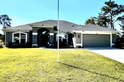 Image de Charming 4/2 house with spa, 8 miles from Wec, 17 mins Hits in welcoming Ocala