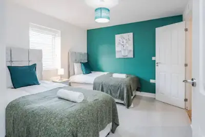 Image de K Suites - Spacious 5 Bedroom with Garden and WiFi