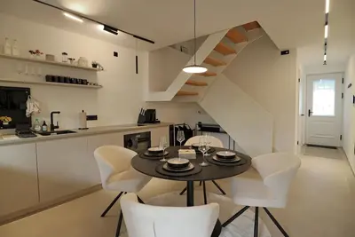 Image de Vacation home directly on the Moselle in Trier. New building for 6 people with parking space