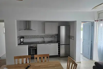 Image de Appartement spacieux et calme aux abords de la rivière.