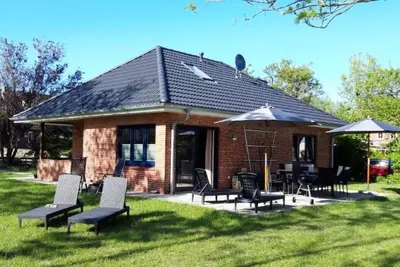 Image de Maison de vacances 'Tante Käthe' avec terrasse privée, jardin privé et Wi-Fi