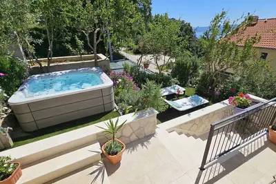 Image de New! 3-Bedroom Holiday Sunset House with Jacuzzi