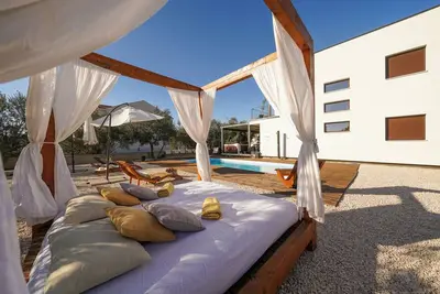 Image de Spacious house in charming Sukošan with Heated Pool, Jacuzzi and Bikes