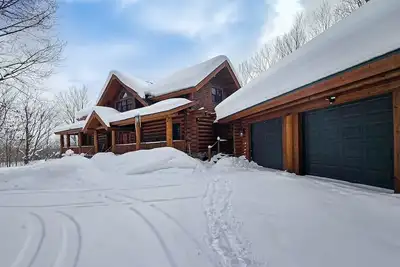 Log Haven: Pool Access, Championship Golf & Torch Lake Getaway