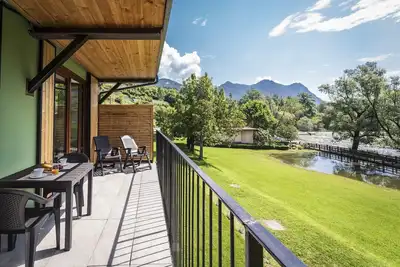 Image de Appartement de vacances \"1\" avec vue sur lac, piscine partagée et jardin partagé