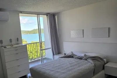 Only by boat chic 2-bedroom apartment with Ac, WiFi in private island in Fajardo