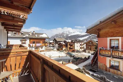 Image de Appartement 'Natale 8' avec 2 chambres, 2 salles de bain, vue montagne, balcon et Wi-Fi