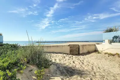 Image de Appartement T4 en bord de plage avec terrasse et parking à Carnon