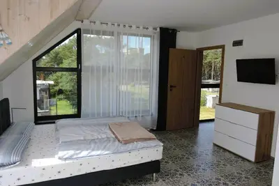 Image de Une maison de vacances confortable à Mrzeżyno.
