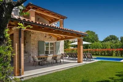 Image de Villa Petra - Style campagnard typique avec piscine