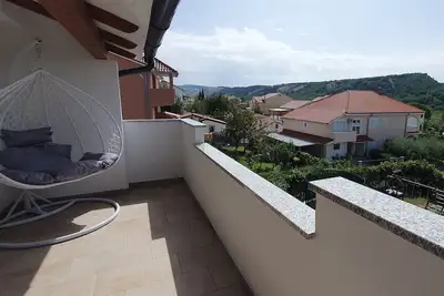 Image de Appartement de deux chambres avec le balcon Lopar, Rab (A-22227-d)