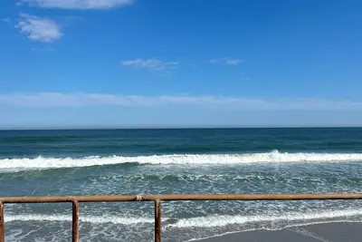 Tranquil 2-bedroom unit, Steps from the beach!