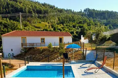 Image de Villae Ceira e Serra-Charming Rustic Family House with Pool near Serra da Lousa