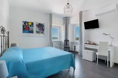 Image de Chambre 'Matrimoniale Con Vista Montagna' avec vue sur la montagne, Wi-Fi et climatisation