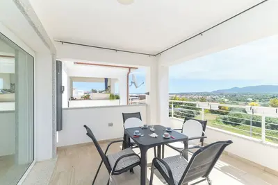 Image de Maison de vacances 'Virgi Vista Mare' avec vue sur la mer, terrasse privée et climatisation