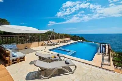 Maison de campagne 'Ses Penyes' avec vue sur la mer, Wi-Fi et climatisation