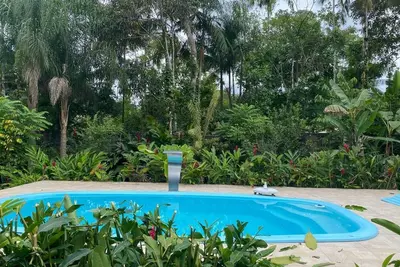 Image de Farm with swimming pool. Waterfall 200 meters away, in the Caiubura Condominium Bertioga, Sp