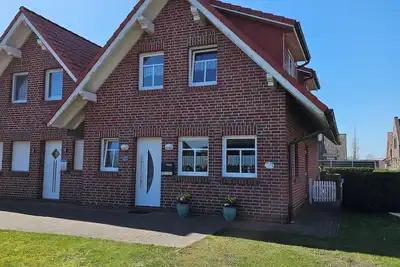 Image de Vacation home \"Sanne\" Norddeich, 300m to the dike, 500m to the dog beach, garden
