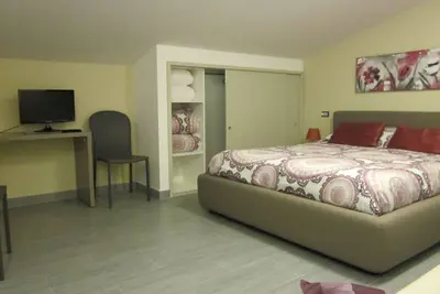 Image de Quadruple Room Delux - Bedroom with lake view