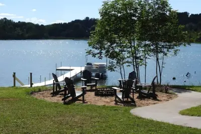Charming 3-bedroom home on the Cheboygan River w/ Boat Dock and Kayaks