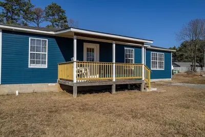 Image de “The Blue Bungalow” Great location Rv hookup addon